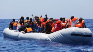 A rubber dinghy carrying migrants in the Mediterranean Sea. Photo/ International Organization of Migration